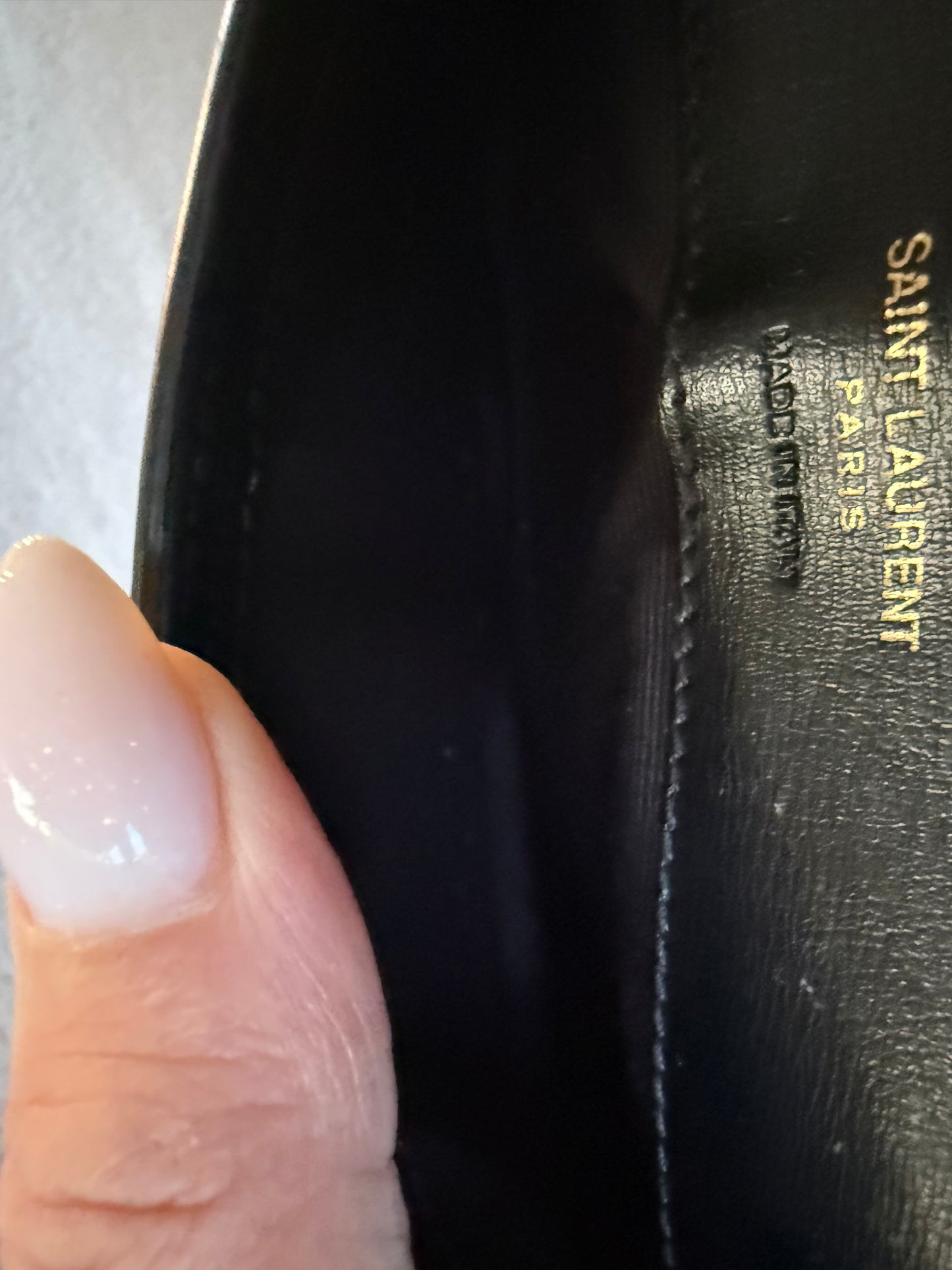 Saint Laurent Cassandre phone holder in black leather bag