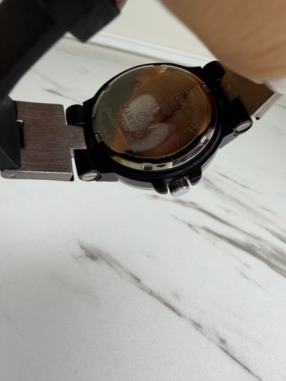 Bvlgari Diagono Titanium Automatic Watch with a cream dial and black rubber strap.
