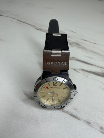 Bvlgari Diagono Titanium Automatic Watch with a cream dial and black rubber strap.