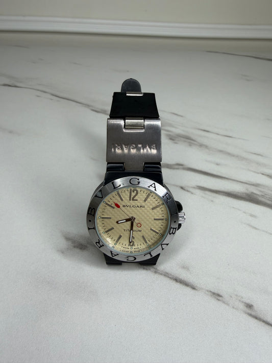 Bvlgari Diagono Titanium Automatic Watch with a cream dial and black rubber strap.