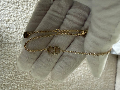 Dior bracelet gold finish metal with white crystals