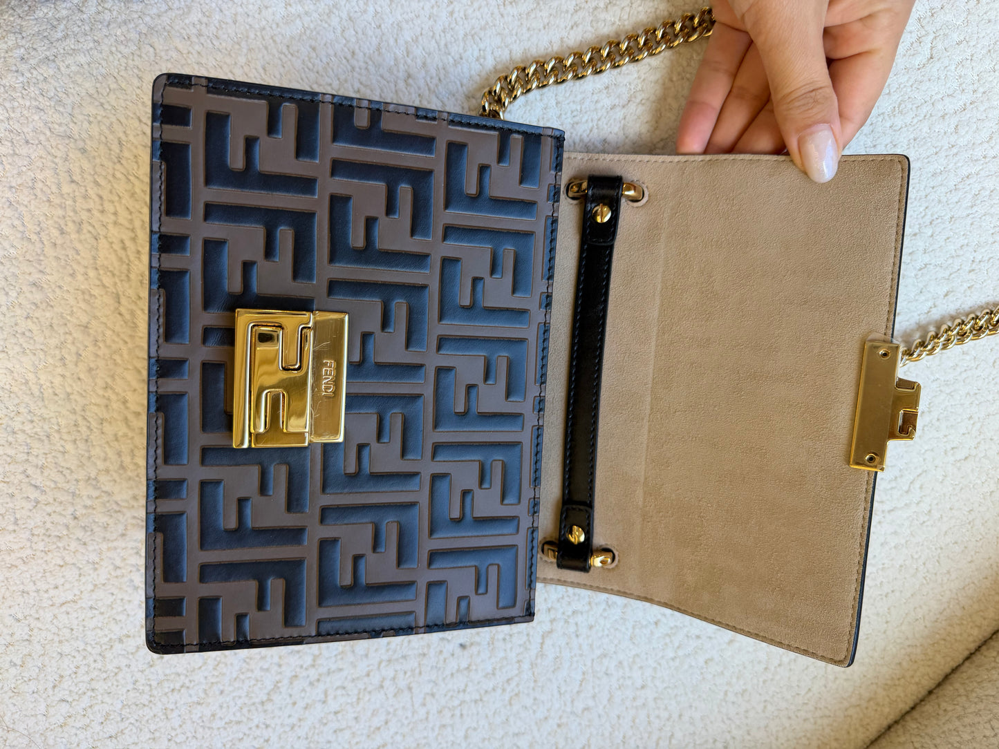 Fendi bag with the FF embossed pattern and FF turn-lock hardwear