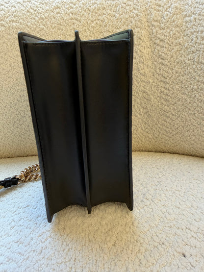 Fendi bag with the FF embossed pattern and FF turn-lock hardwear