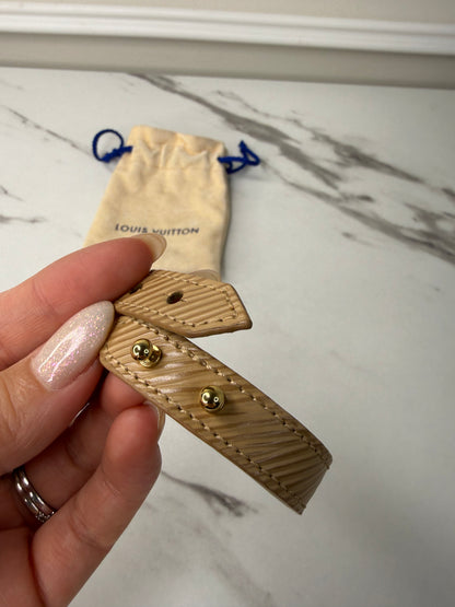 Louis Vuitton Camel Epi Leather Twist Bracelet with a gold-toned logo turn lock
