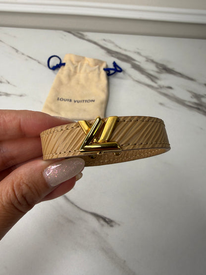 Louis Vuitton Camel Epi Leather Twist Bracelet with a gold-toned logo turn lock