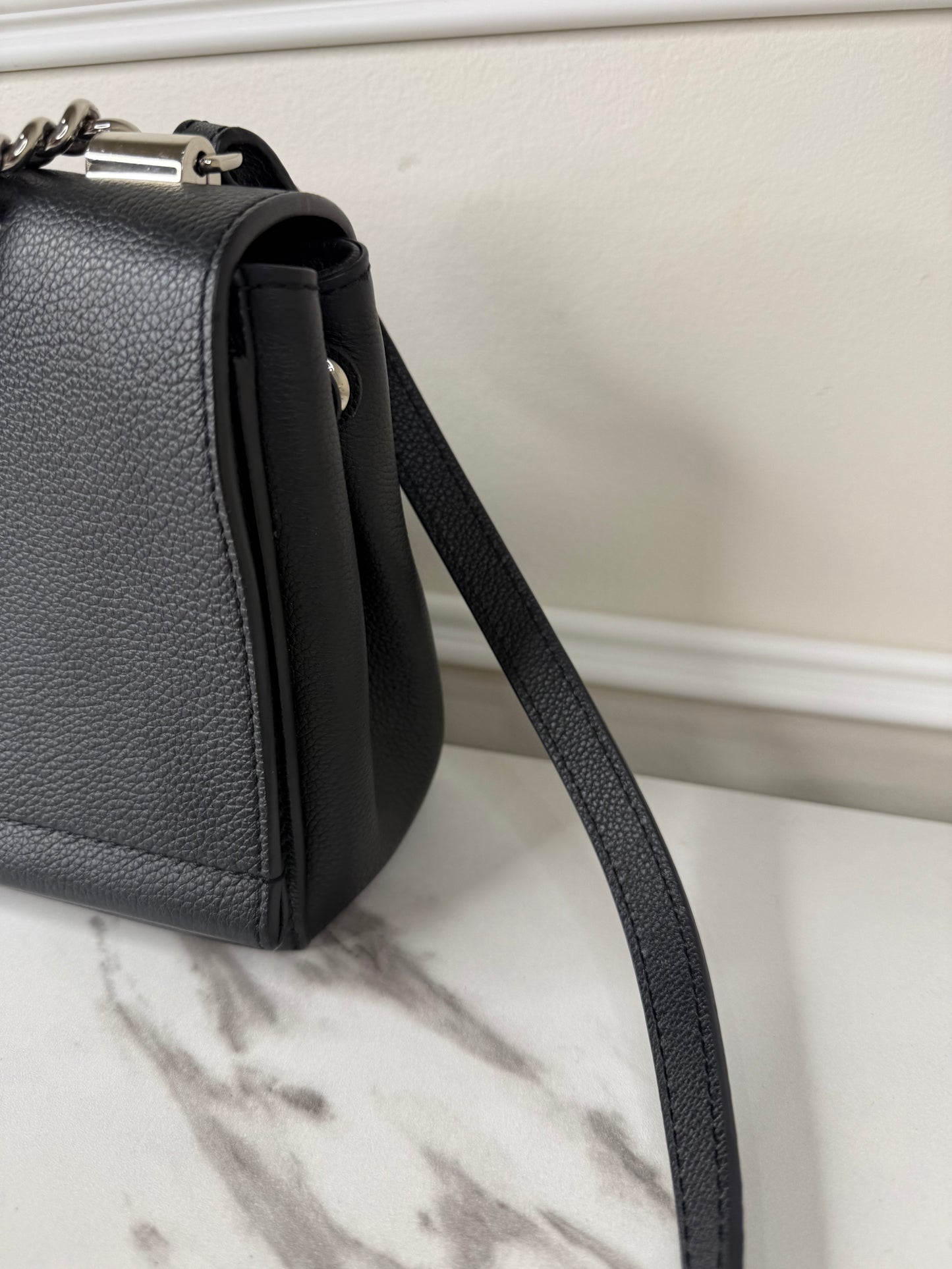 Louis Vuitton Lockme II BB bag in black grained calfskin leather with silver-tone hardware