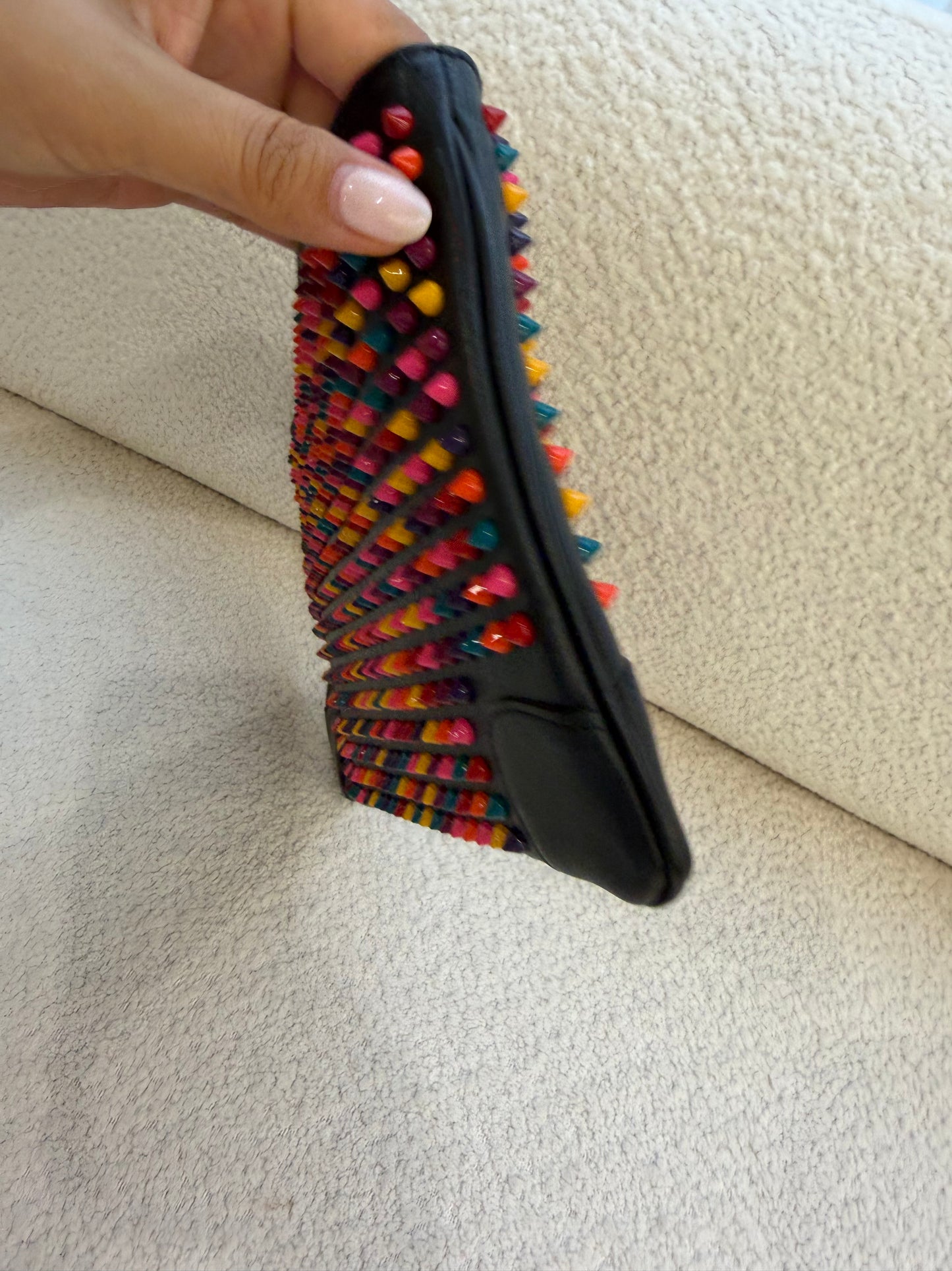 Christian Louboutin spiked bag 
RRP $1290