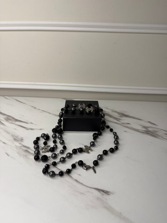 Chanel CC Logo long necklace featuring black and grey beads