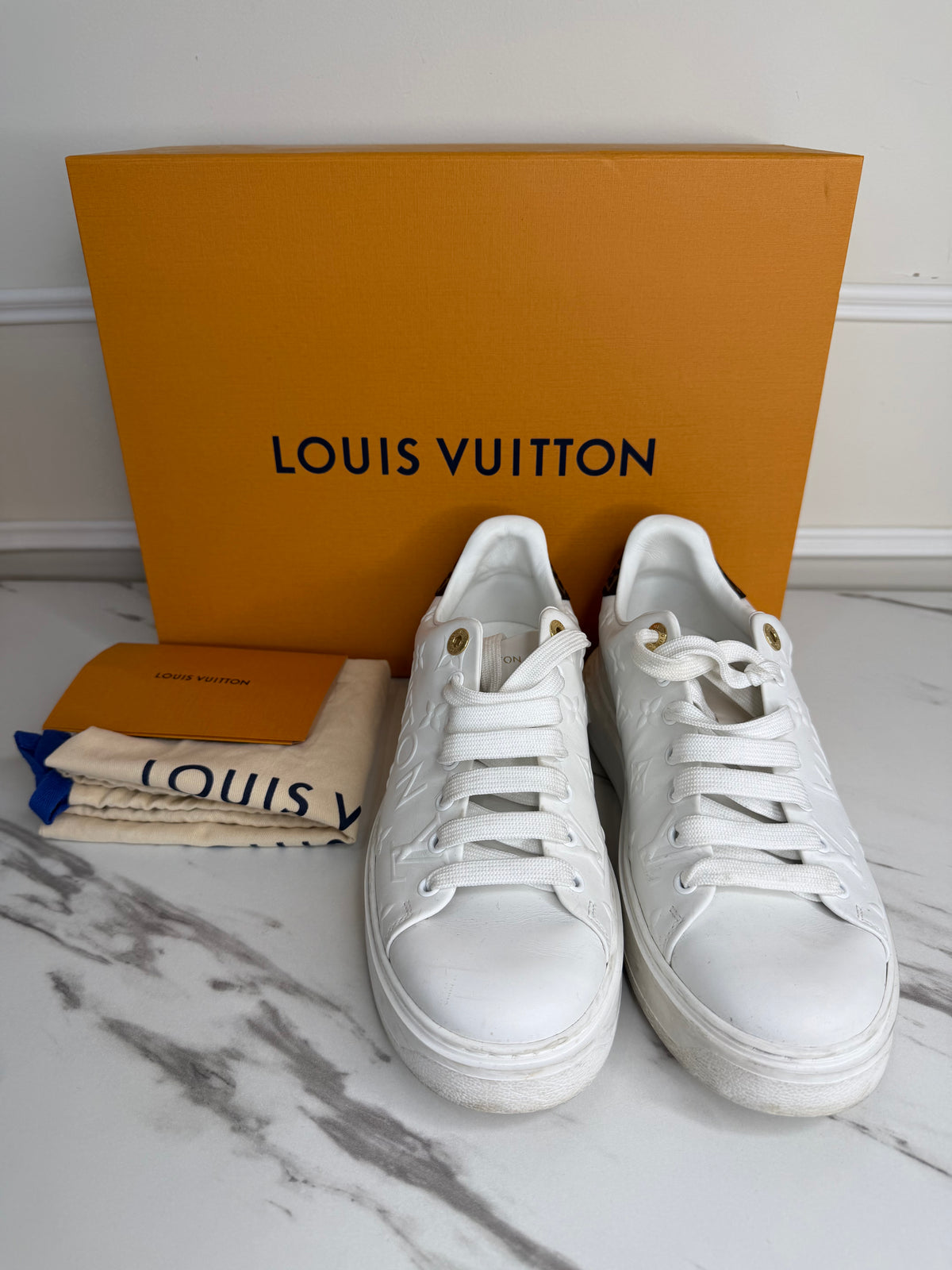 White Monogram Embossed Time Out Sneakers