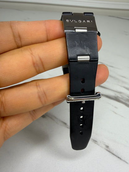 Bvlgari Diagono Titanium Automatic Watch with a cream dial and black rubber strap.