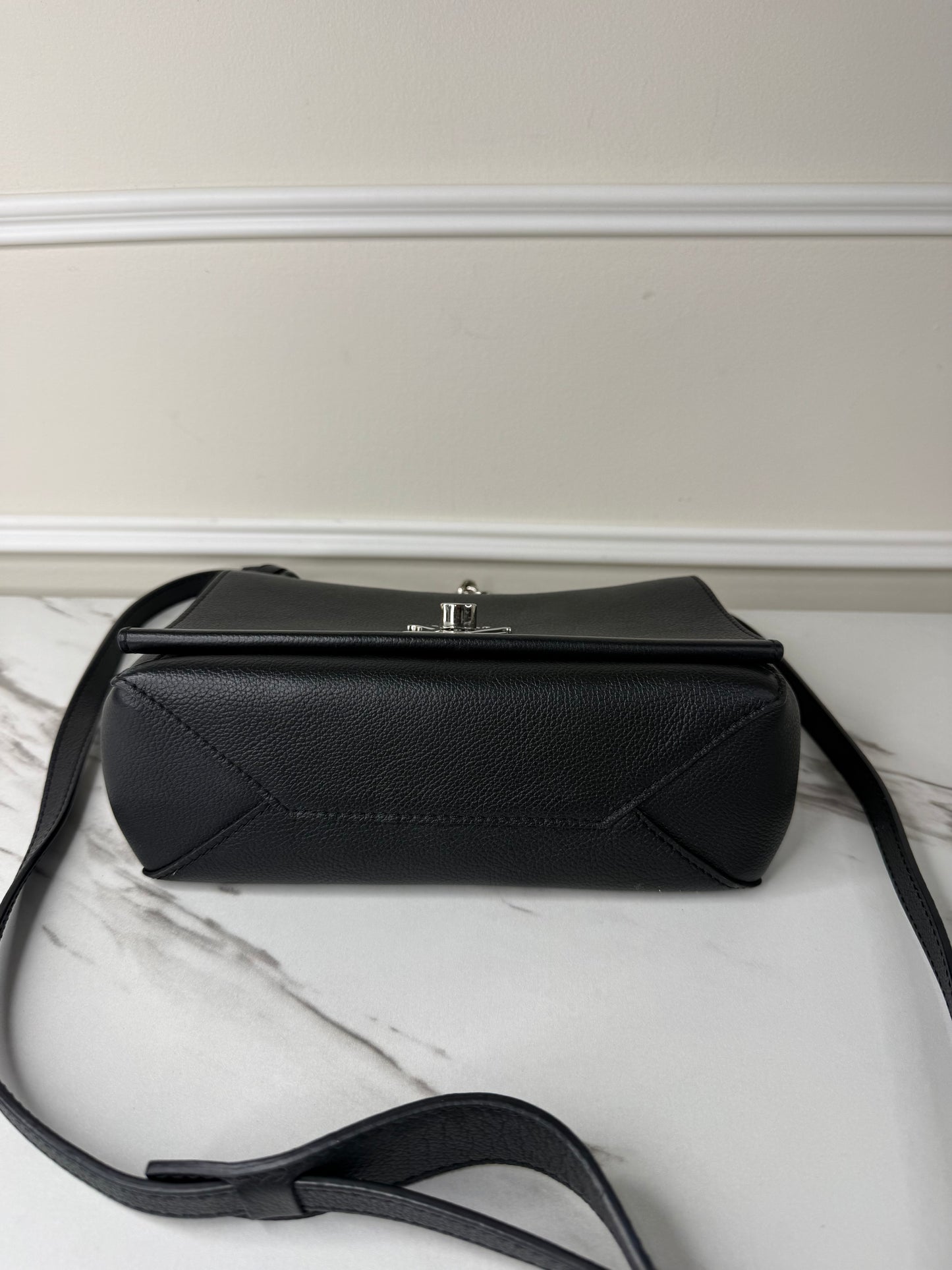 Louis Vuitton Lockme II BB bag in black grained calfskin leather with silver-tone hardware