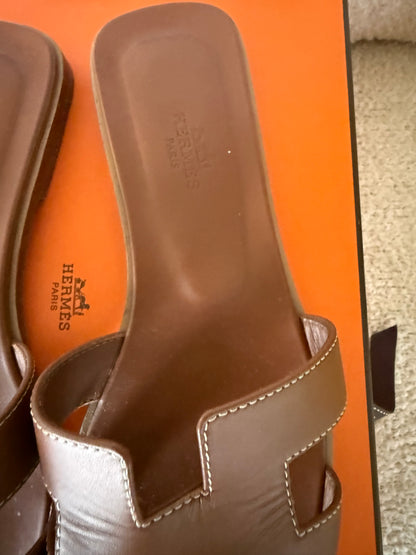 Hermes’ Oran sandals gold size 38