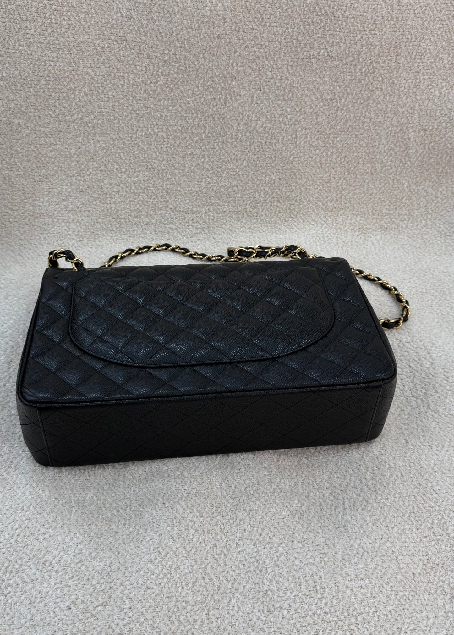 Chanel caviar maxi classic flap black gold