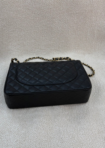 Chanel caviar maxi classic flap black gold