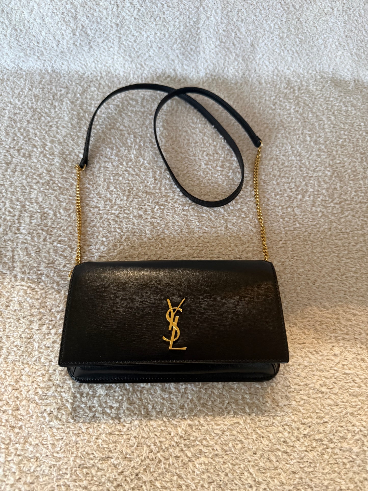 Saint Laurent Cassandre phone holder in black leather bag