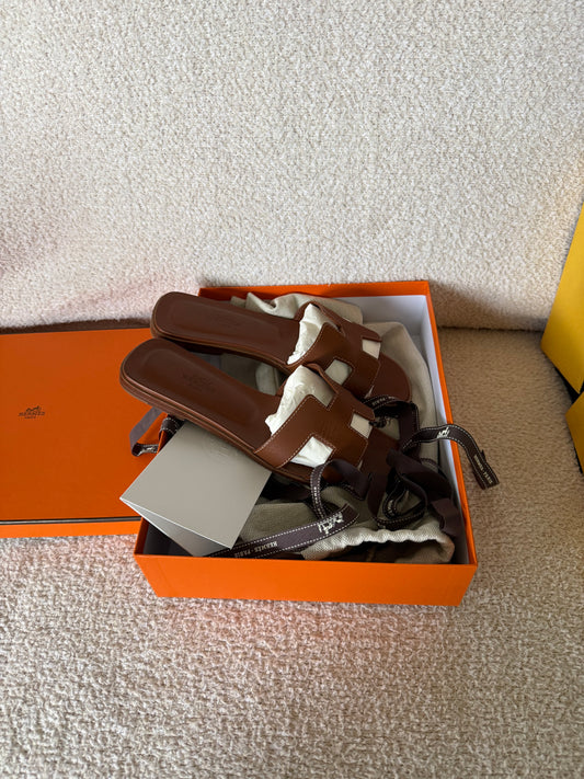 Hermes’ Oran sandals gold size 38