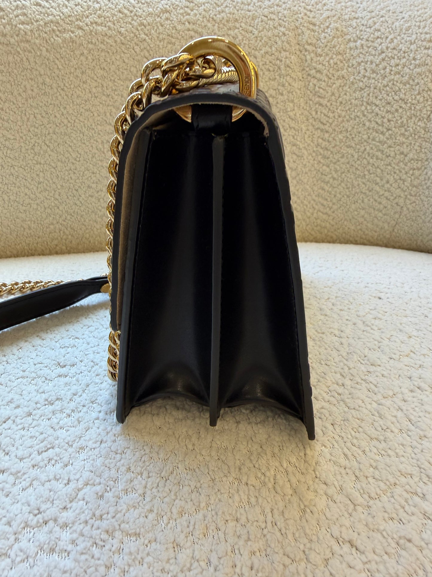 Fendi bag with the FF embossed pattern and FF turn-lock hardwear