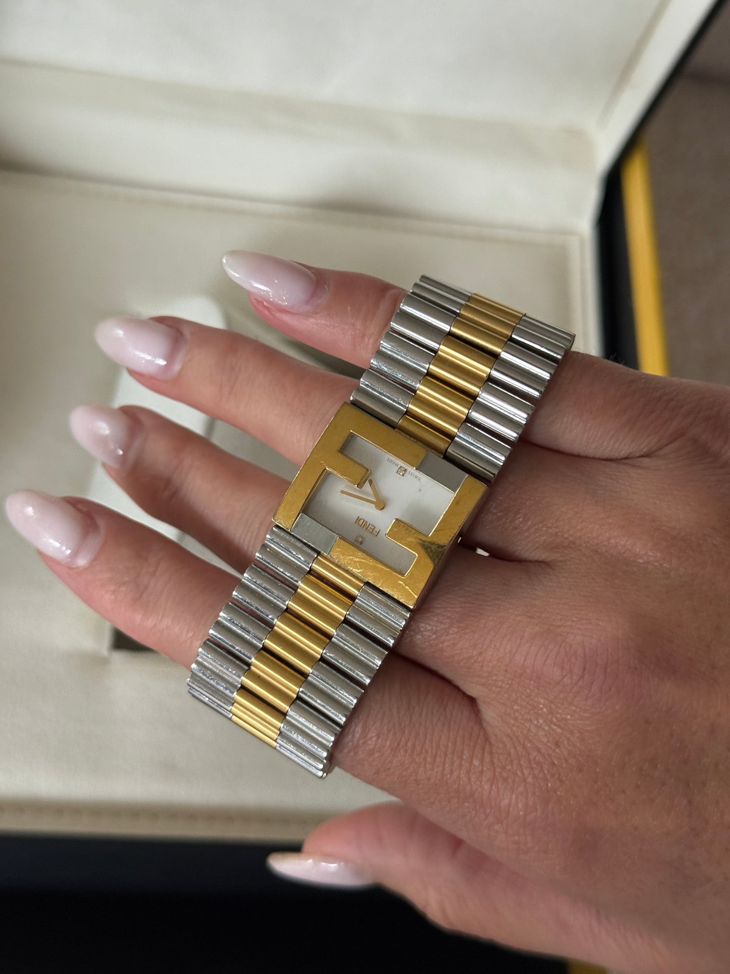 Fendi Fendimania bracelet watch featuring a two-tone stainless steel