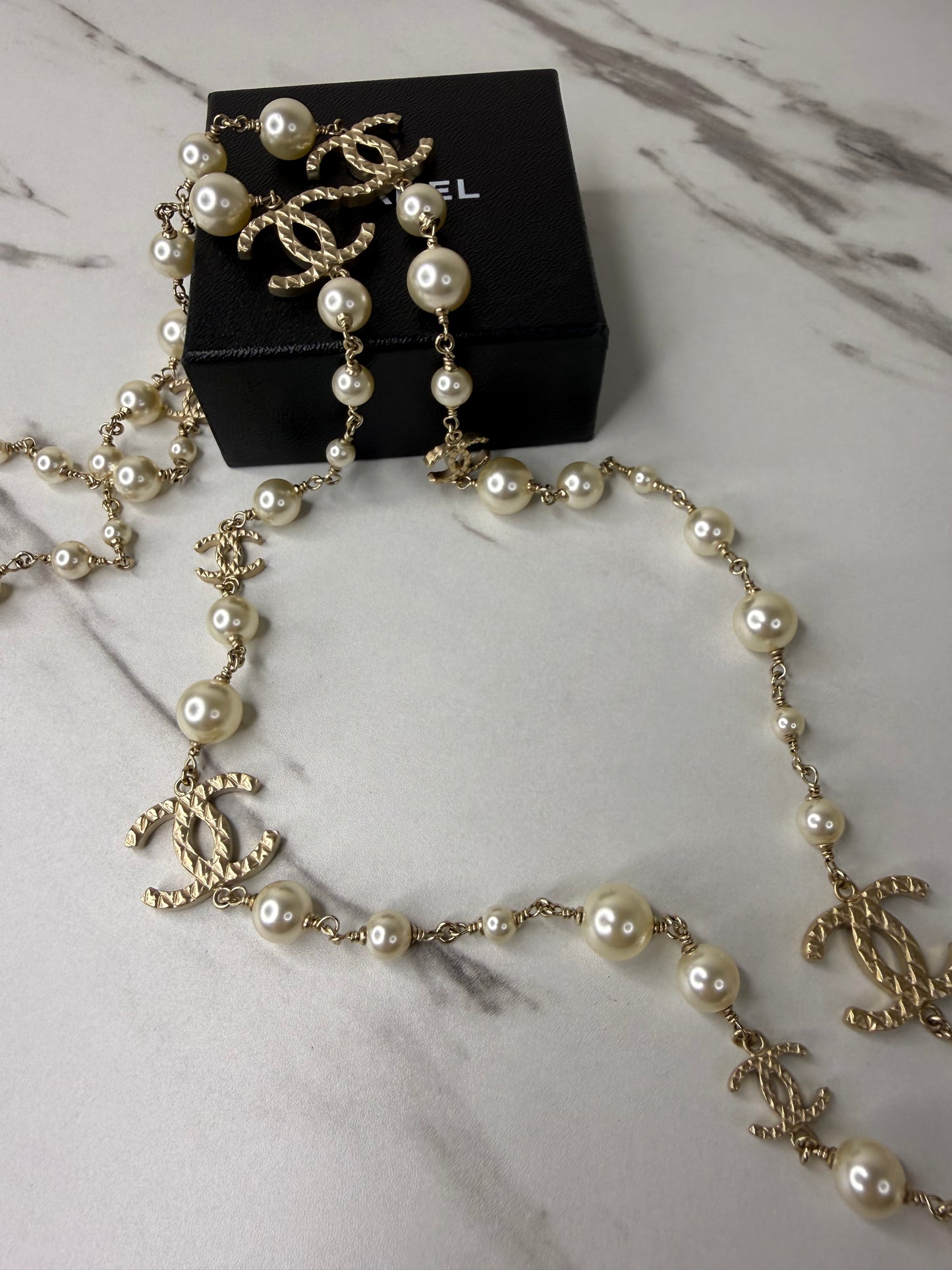 Chanel long pearl and crystal CC necklace