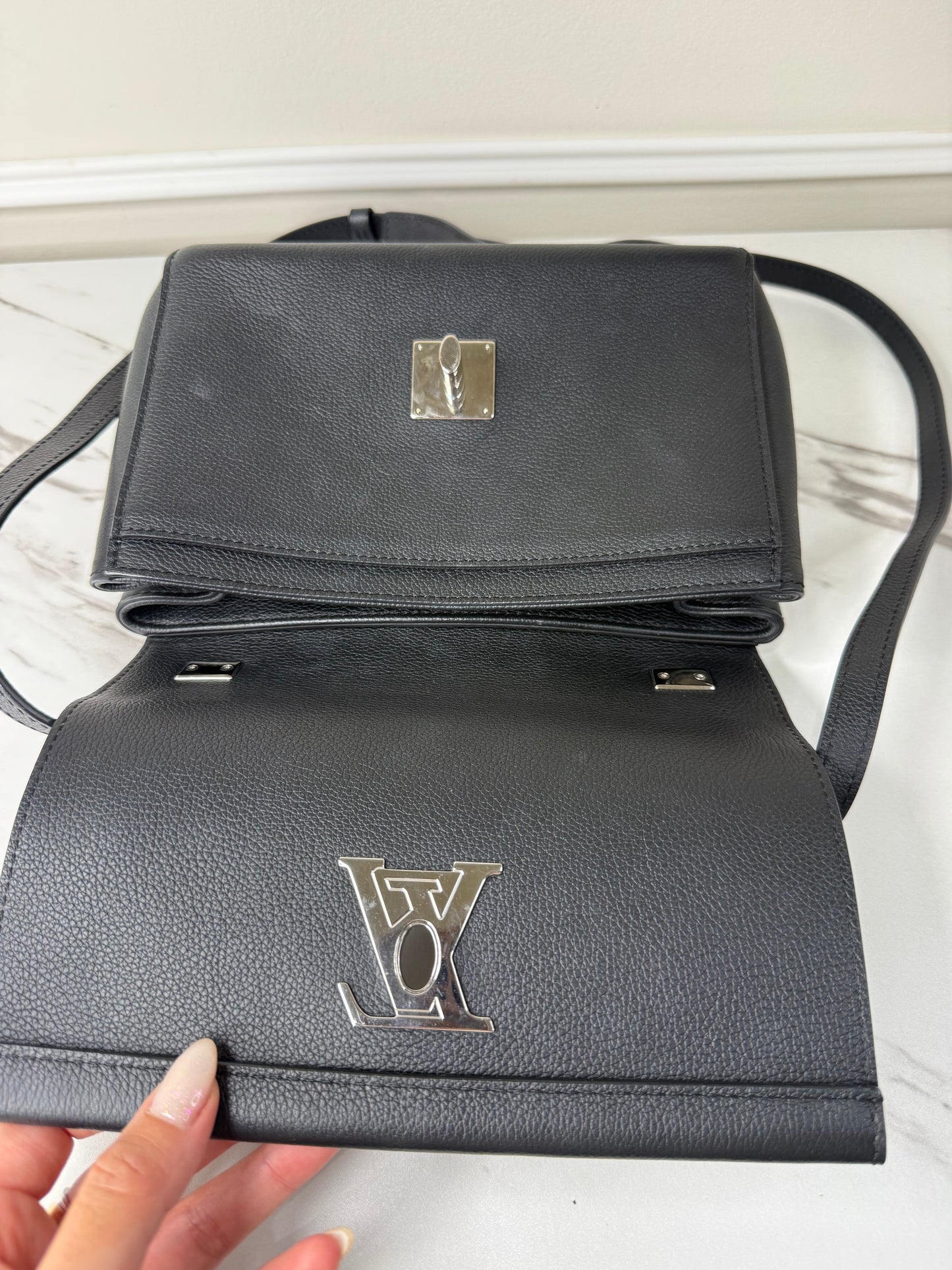 Louis Vuitton Lockme II BB bag in black grained calfskin leather with silver-tone hardware
