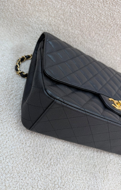 Chanel caviar maxi classic flap black gold