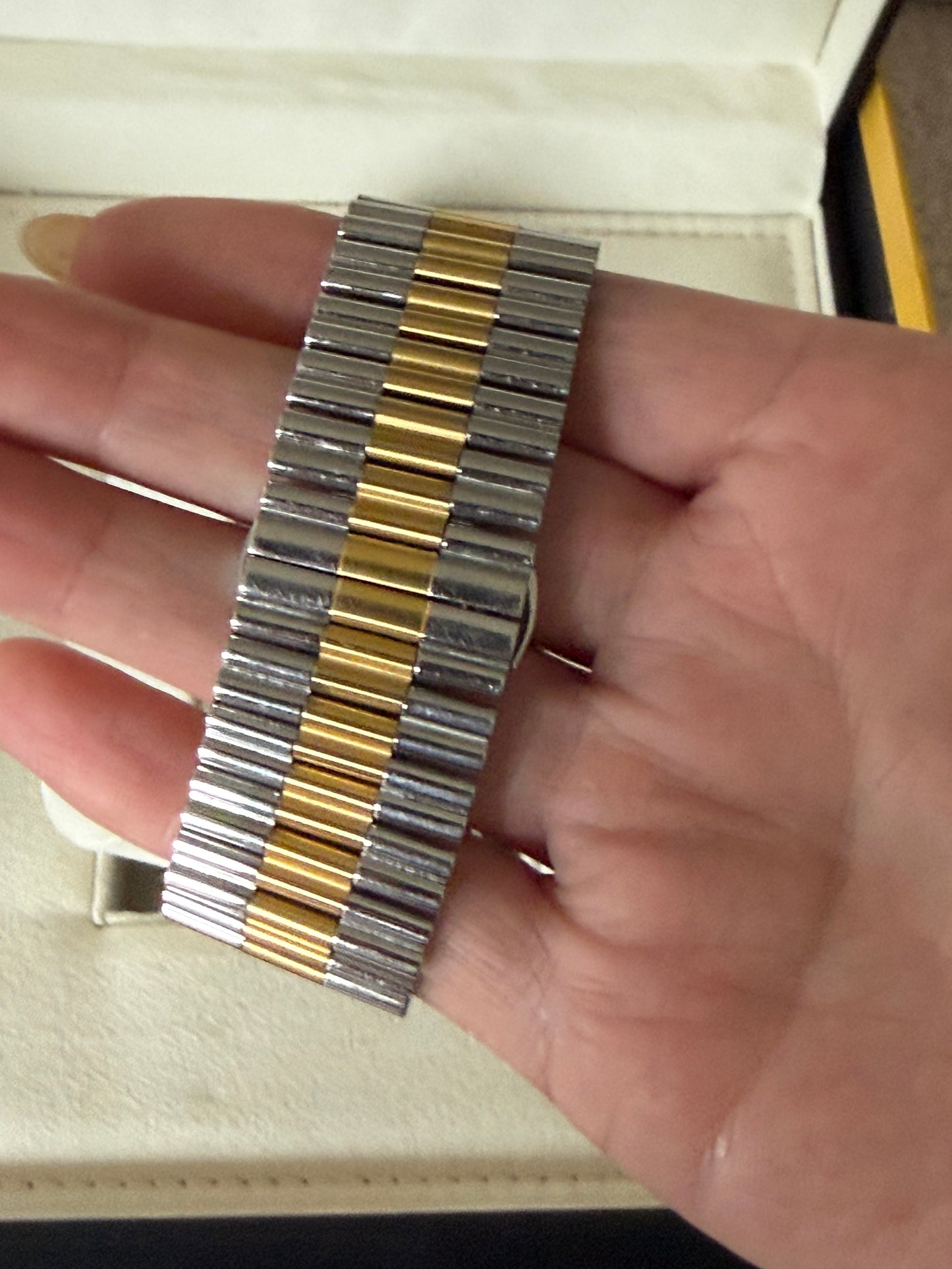 Fendi Fendimania bracelet watch featuring a two-tone stainless steel