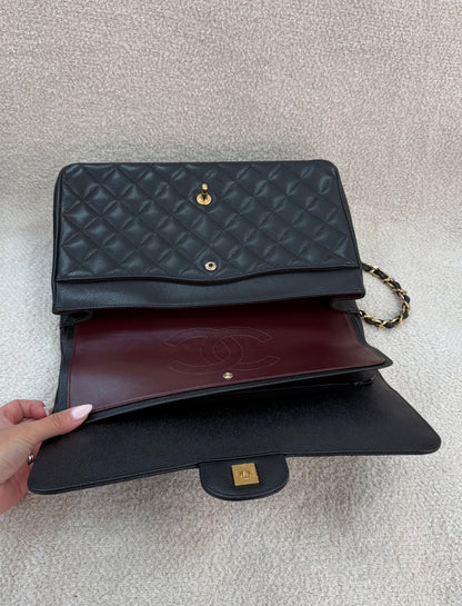 Chanel caviar maxi classic flap black gold