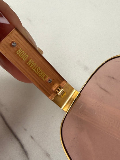 DiorSignature S5U sunglasses featuring gold frames and pink lenses