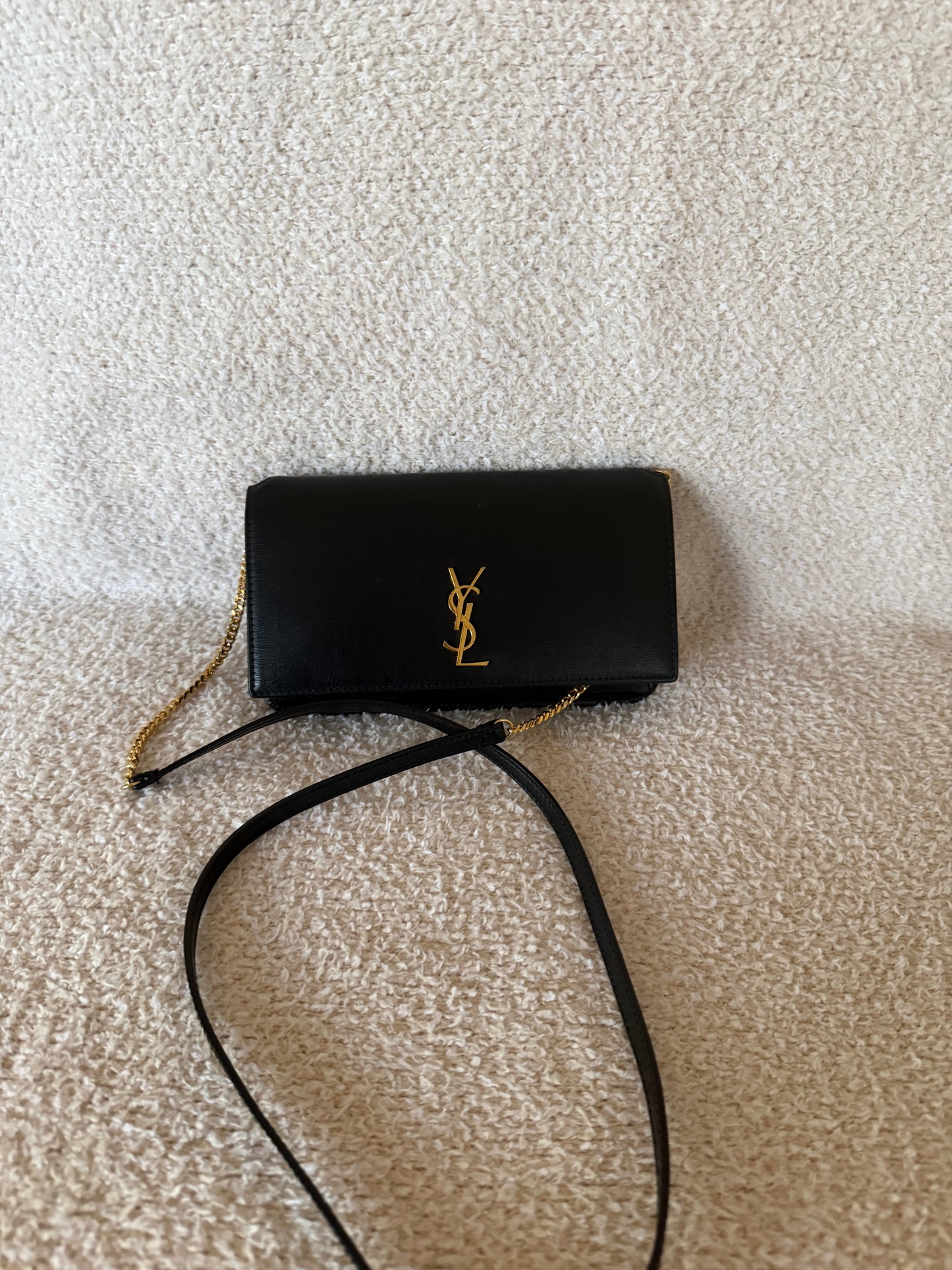 Saint Laurent Cassandre phone holder in black leather bag