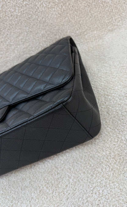 Chanel caviar maxi classic flap black gold