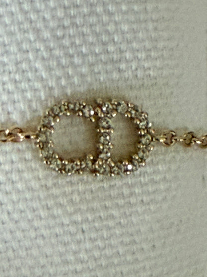 Dior bracelet gold finish metal with white crystals