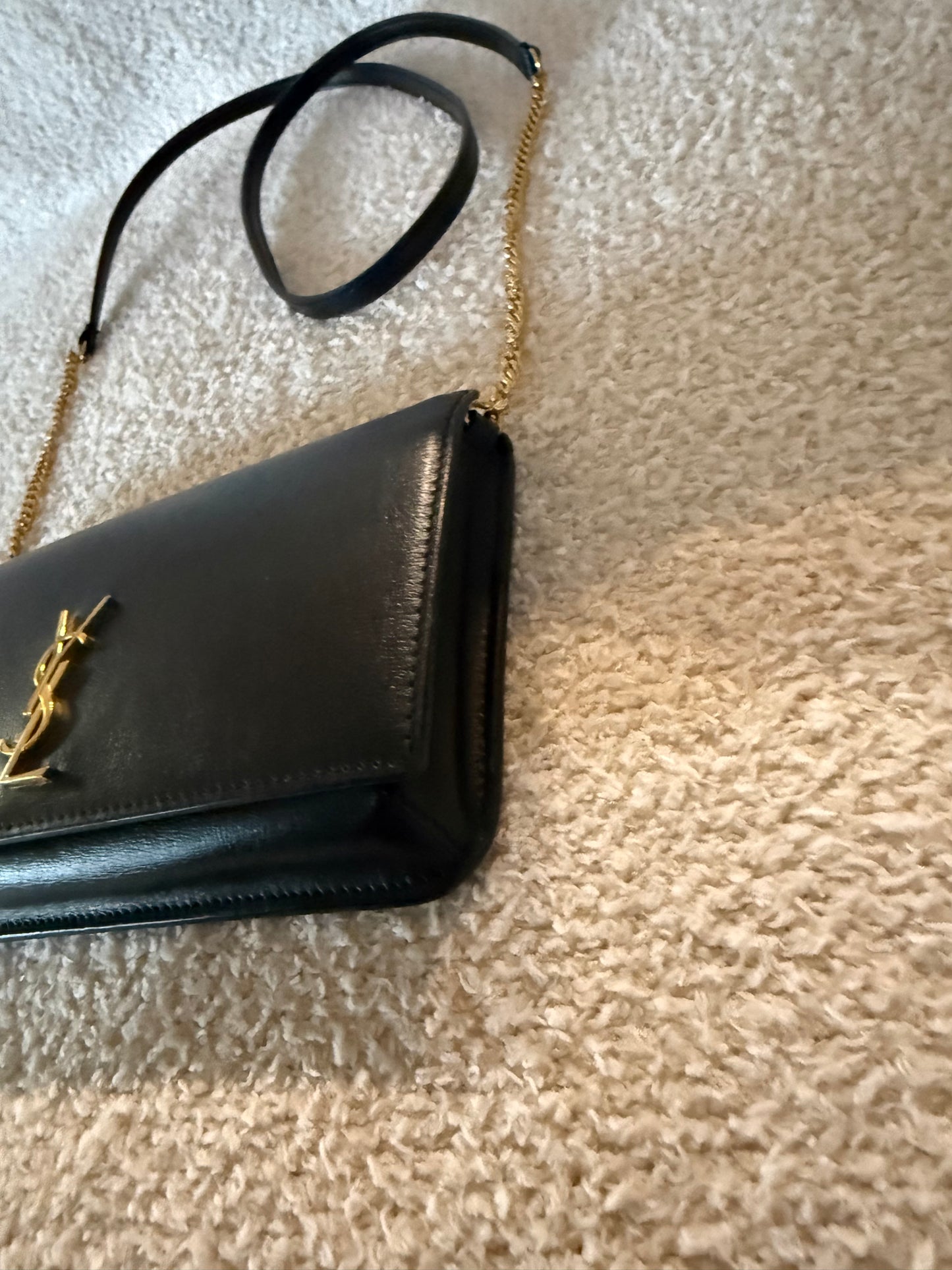 Saint Laurent Cassandre phone holder in black leather bag