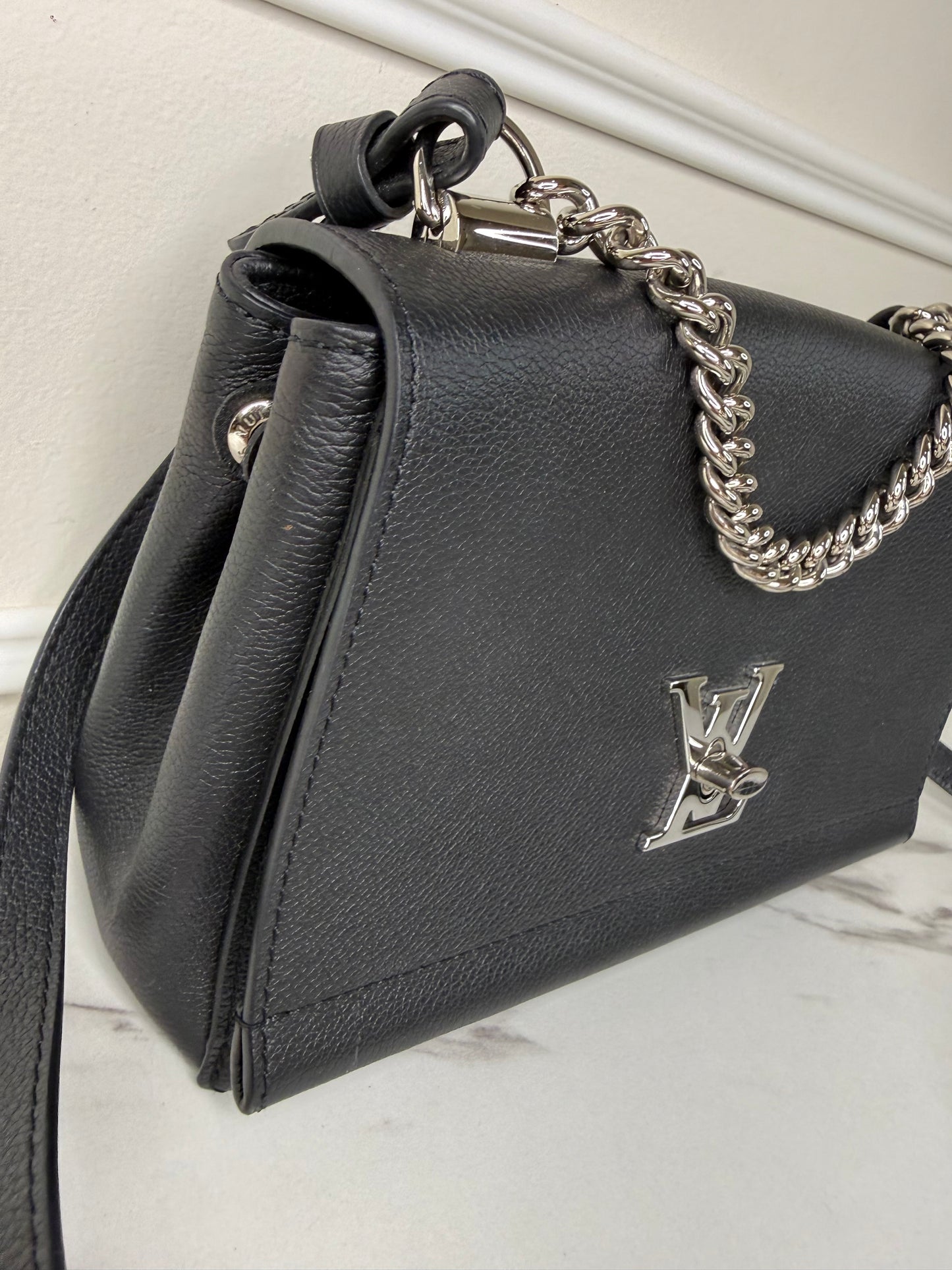 Louis Vuitton Lockme II BB bag in black grained calfskin leather with silver-tone hardware