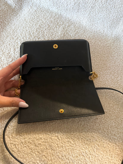 Saint Laurent Cassandre phone holder in black leather bag