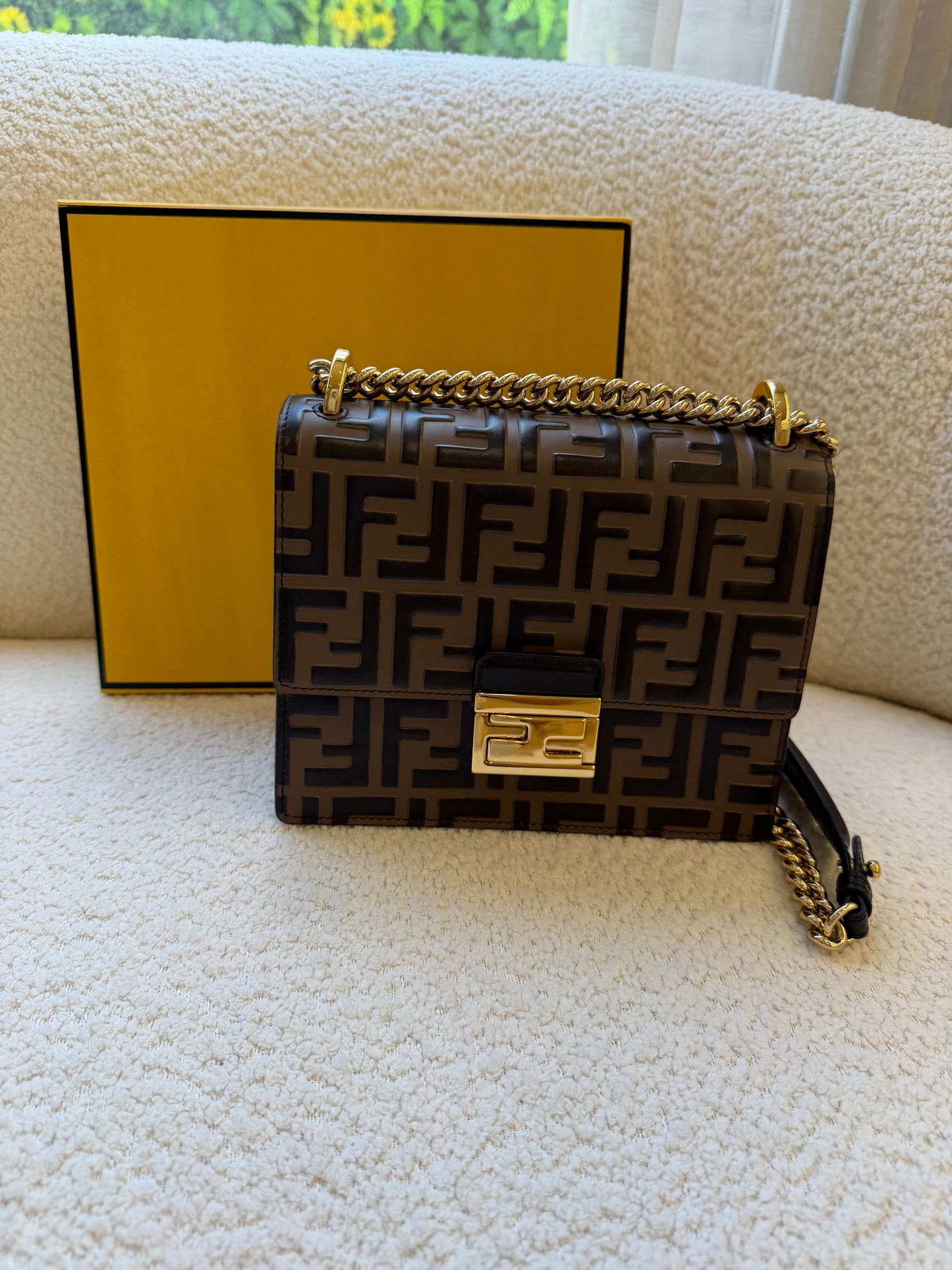 Fendi bag with the FF embossed pattern and FF turn-lock hardwear
