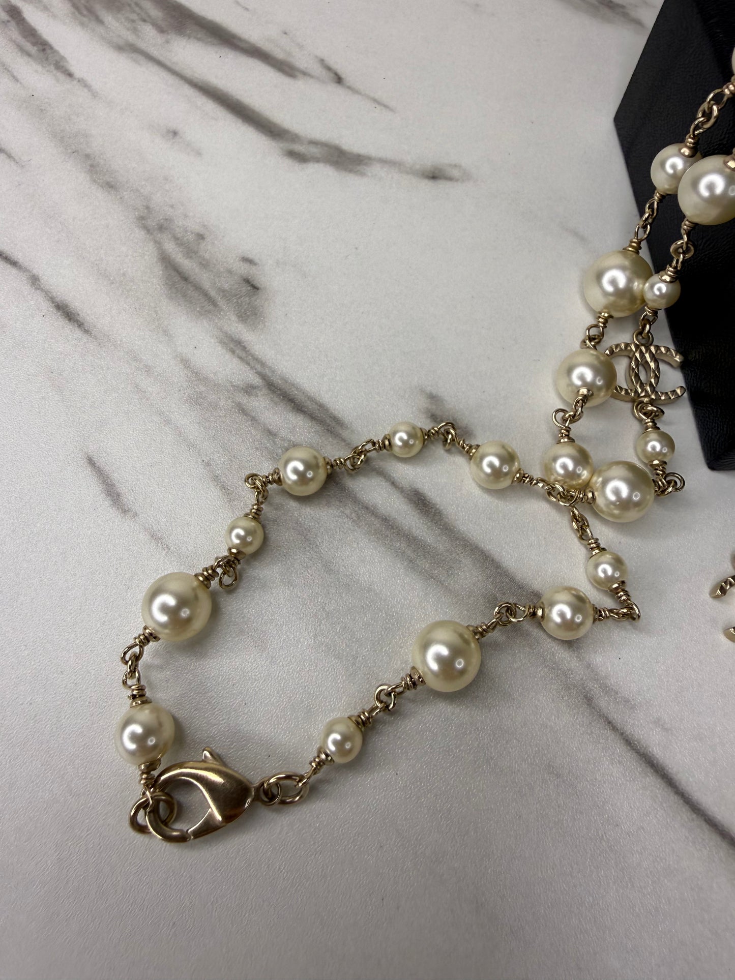 Chanel long pearl and crystal CC necklace