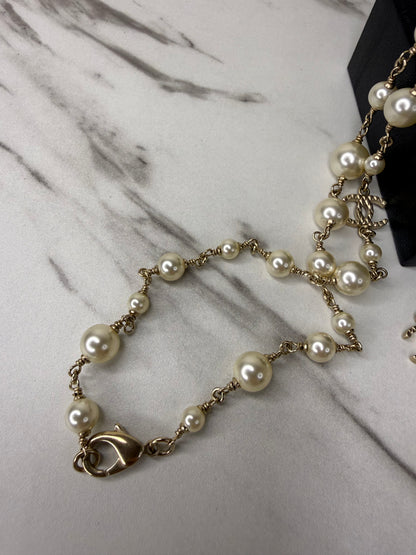 Chanel long pearl and crystal CC necklace