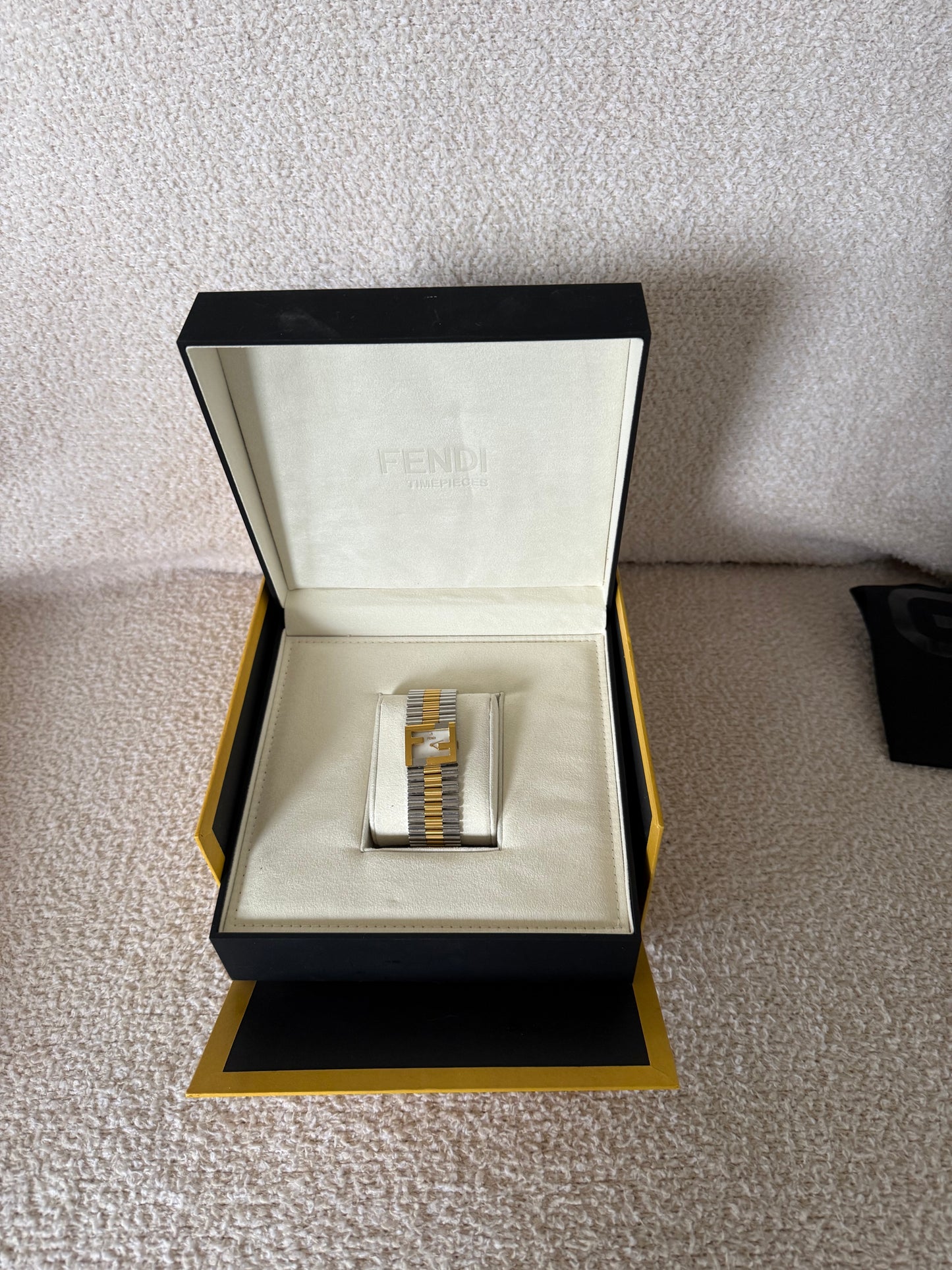 Fendi Fendimania bracelet watch featuring a two-tone stainless steel