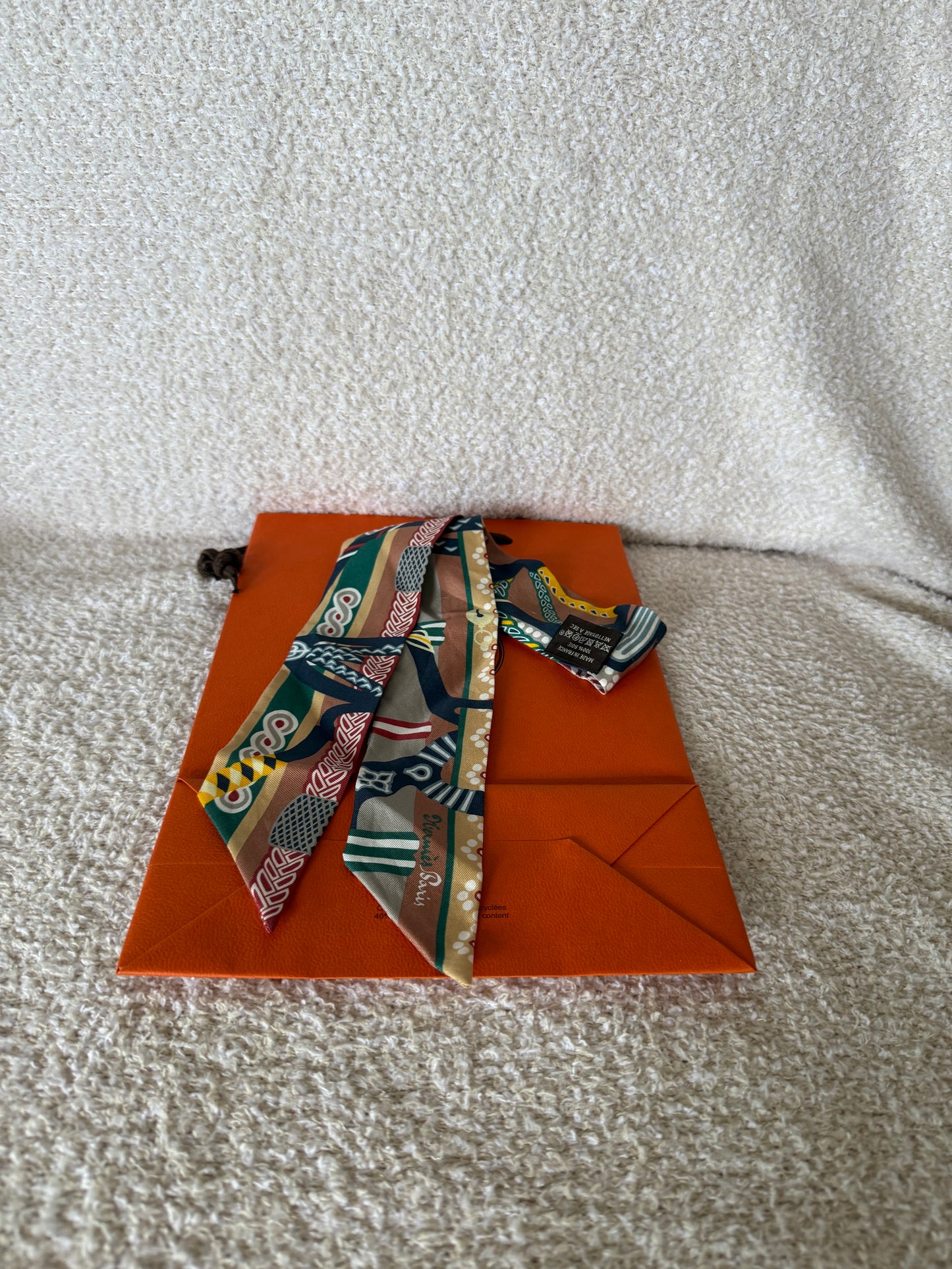Hermes Twilly 86 silk scarf in a multicolour "Fantaisie D'Etriers" patte