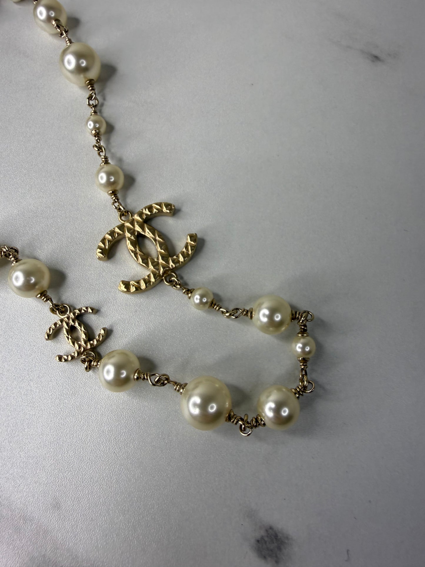 Chanel long pearl and crystal CC necklace