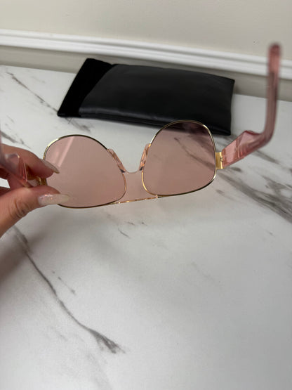 DiorSignature S5U sunglasses featuring gold frames and pink lenses