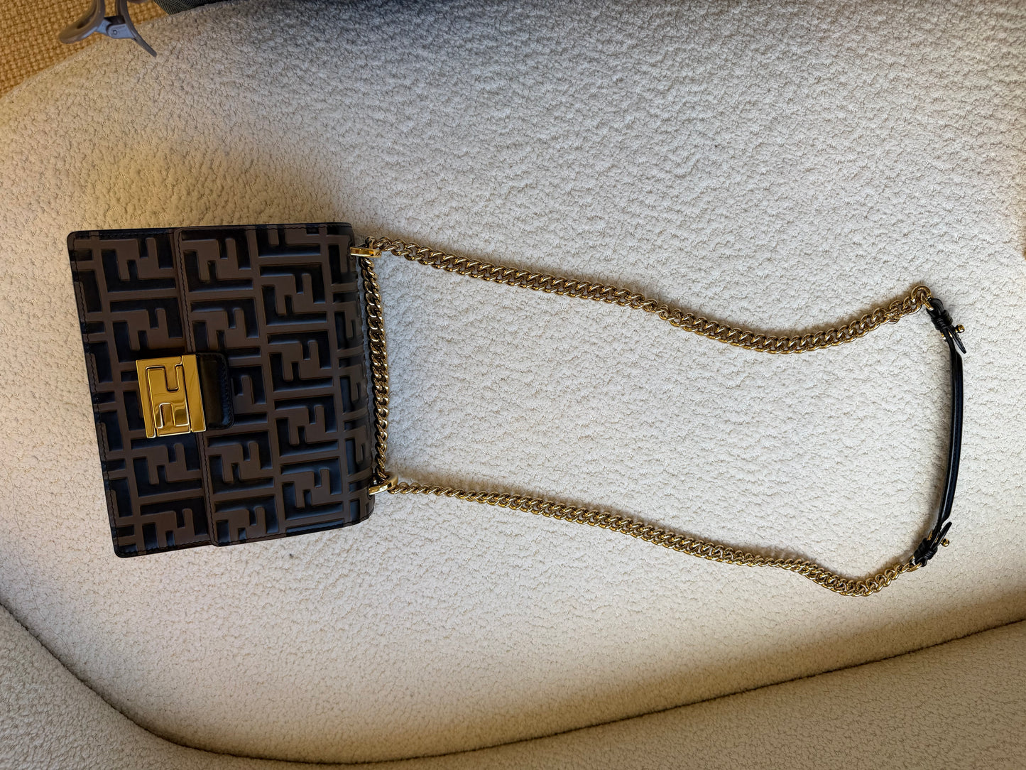 Fendi bag with the FF embossed pattern and FF turn-lock hardwear