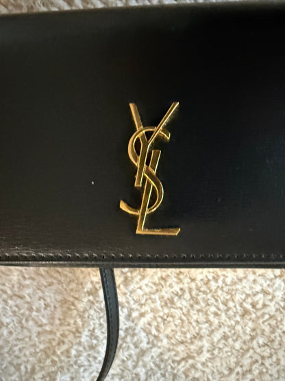 Saint Laurent Cassandre phone holder in black leather bag