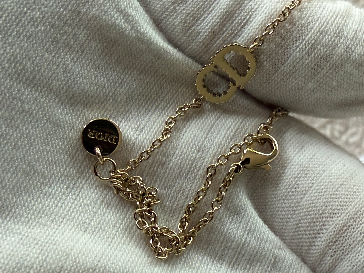 Dior bracelet gold finish metal with white crystals