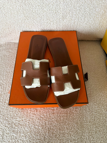 Hermes’ Oran sandals gold size 38