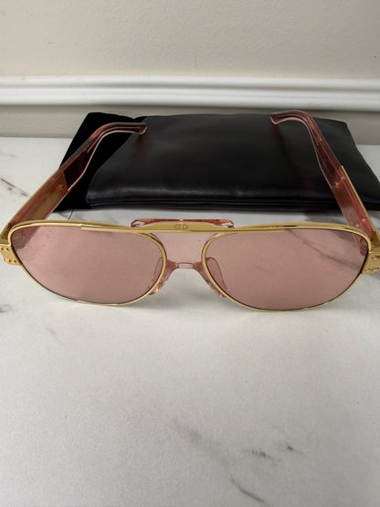 DiorSignature S5U sunglasses featuring gold frames and pink lenses