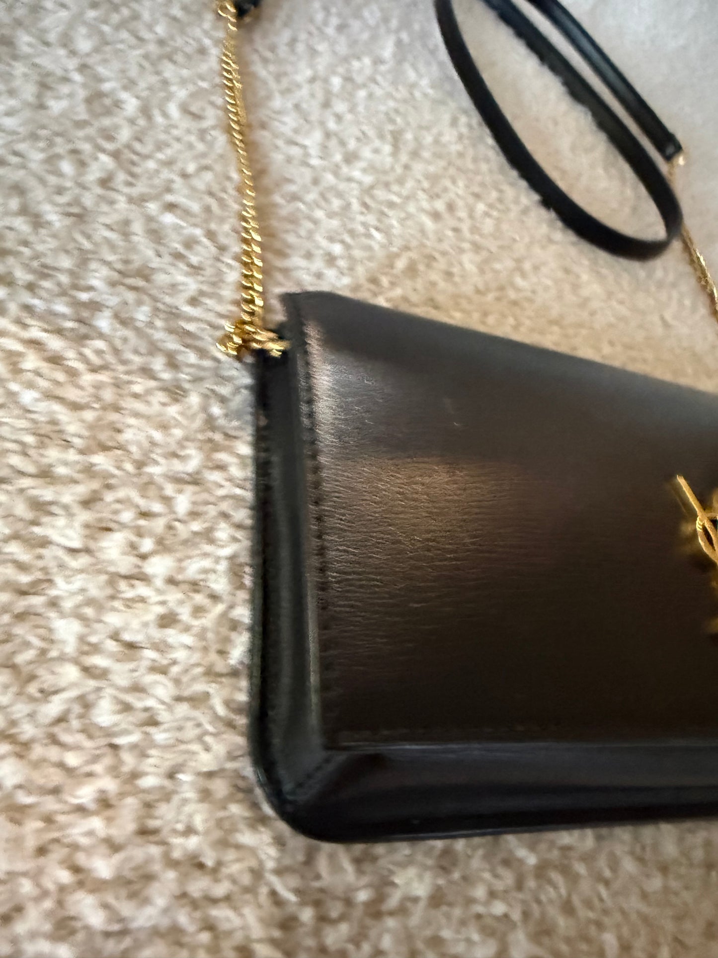 Saint Laurent Cassandre phone holder in black leather bag