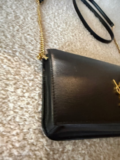 Saint Laurent Cassandre phone holder in black leather bag