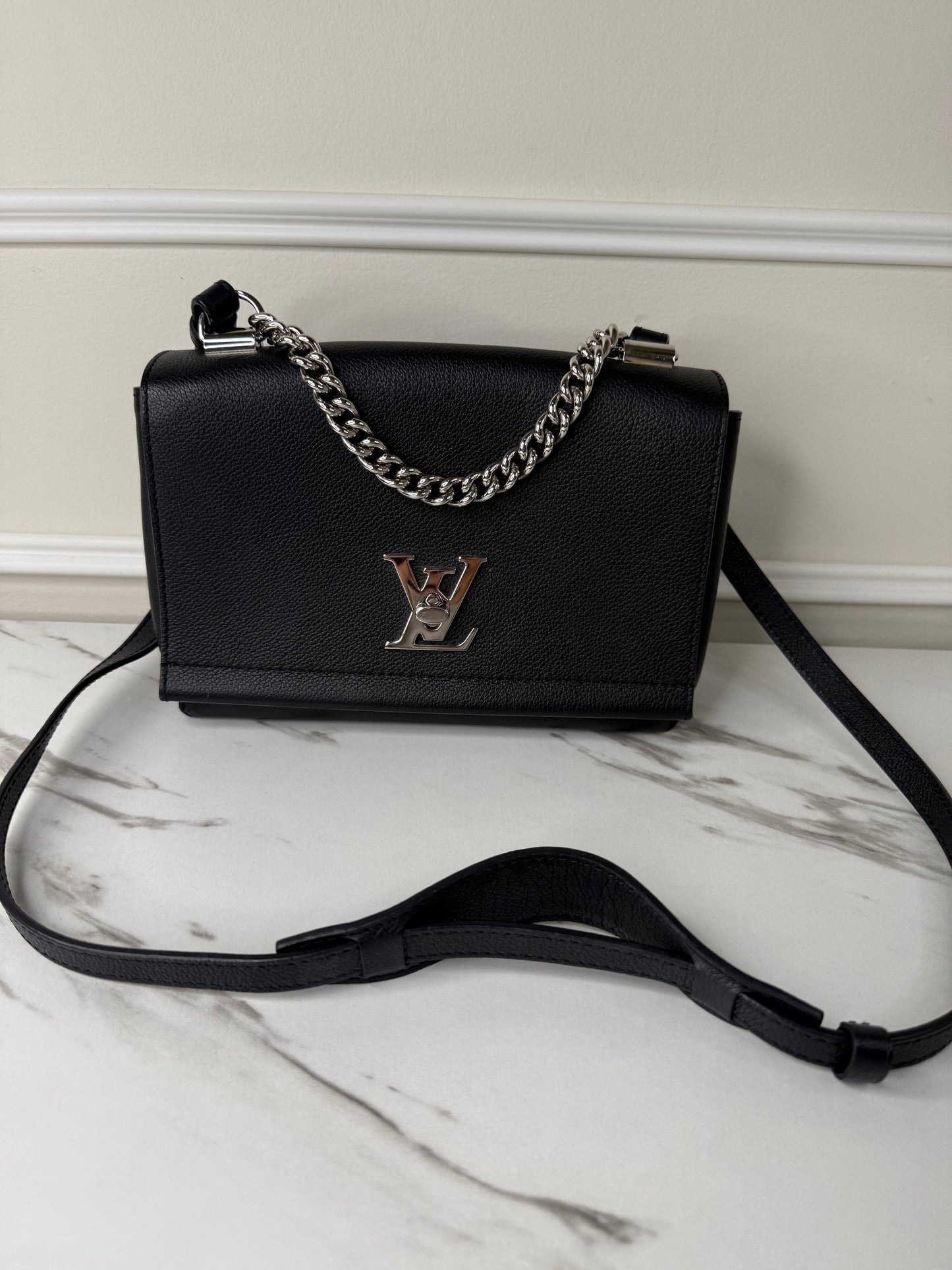 Louis Vuitton Lockme II BB bag in black grained calfskin leather with silver-tone hardware