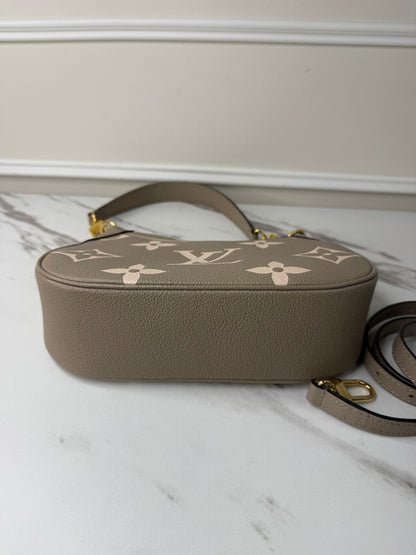 Louis Vuitton Bagatelle NM shoulder bag in tourterelle creme bicolour monogram empreinte leather